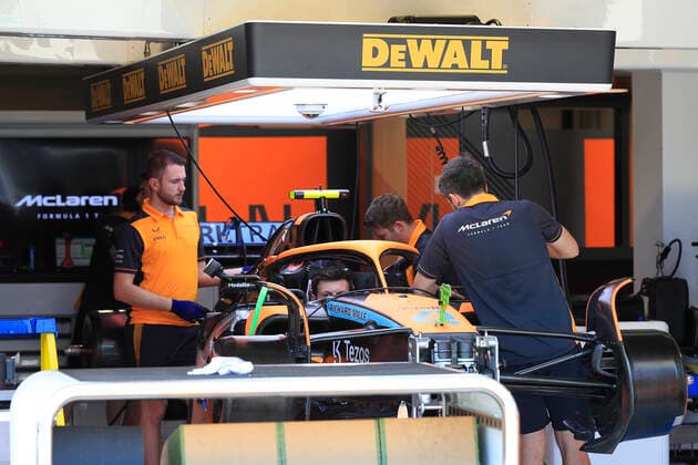 MIAMI GARDENS, FL - MAY 06: Crew members on the 4 team of McLaren Renault driver Lando Norris (4) of Great Britain work on the car before practice for the Crypto.com Miami Grand Prix on May 6, 2022 at the Miami International Autodrome in Miami Gardens, Florida. (Photo by David J. Griffin Icon Sportswire) AUTO: MAY 06 F1 Crypto.com Miami Grand Prix Icon95322050500471