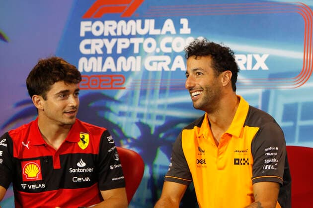 MIAMI GARDENS, FL - MAY 06: McLaren Renault driver Daniel Ricciardo (3) of Australia with Scuderia Ferrari driver Charles Leclerc (16) of Monaco being intiewed prior to for the Formula 1 CRYPTO.COM Miami Grand Prix on May 6, 2022 at Miami International Autodrome in Miami Gardens, FL. (Photo by Jeff Robinson Icon Sportswire) AUTO: MAY 06 F1 Crypto.com Miami Grand Prix Icon22050631921
