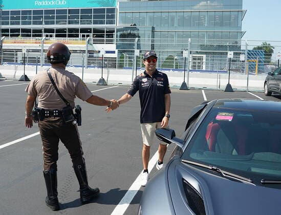 FORMULA 1 CRYPTO COM MIAMI GRAND PRIX 06 05 2022, Miami International Autodrome, Miami, FORMULA 1 CRYPTO COM MIAMI GRAND PRIX ,in picture Sergio Perez MEX , Oracle Red Bull Racing with a policeman nordphotoxGmbHx xBratic nph00250
