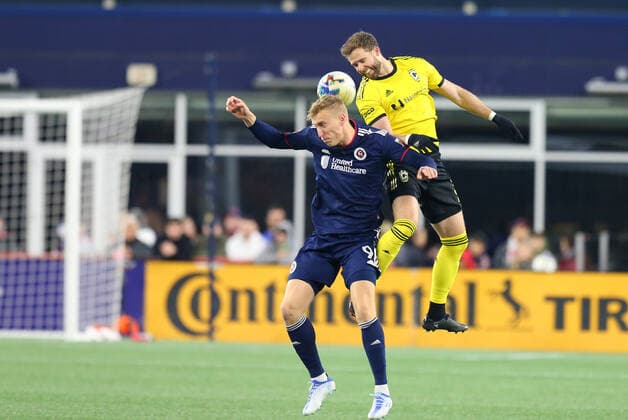May 7, 2022; Foxborough, MA, USA; New England Revolution forward Adam Buksa (9) and Columbus Crew defender Josh Williams (3) in action during an MLS, Fussball Herren, USA match between Columbus Crew and New England Revolution at Gillette Stadium. CSM Foxborough United States - ZUMAc04_ 20220507_zaf_c04_024 Copyright: xAnthonyxNesmithx