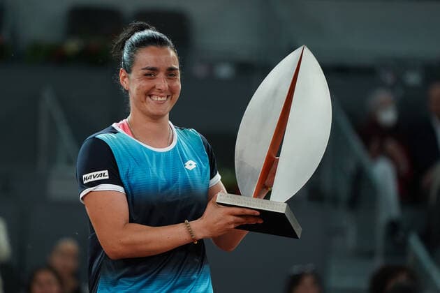 May 8, 2022, Madrid, Spain: Ons Jabeur of Tunisia celebrates with the trophy following victory during the Women s Singles final match against Jessica Pegula of the United States during day ten of Mutua Madrid Open at La Caja Magica. Ons Jabeur beats Jessica Pegula Madrid Spain - ZUMAs197 20220508_zaa_s197_017 Copyright: xAtilanoxGarciax