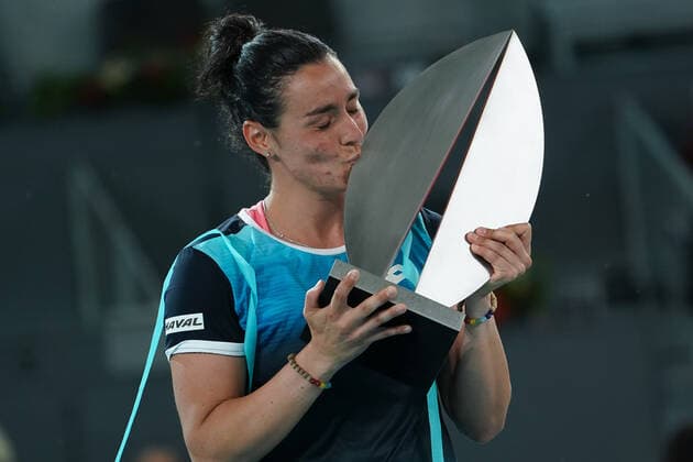 May 8, 2022, Madrid, Spain: Ons Jabeur of Tunisia celebrates with the trophy following victory during the Women s Singles final match against Jessica Pegula of the United States during day ten of Mutua Madrid Open at La Caja Magica. Ons Jabeur beats Jessica Pegula Madrid Spain - ZUMAs197 20220508_zaa_s197_024 Copyright: xAtilanoxGarciax