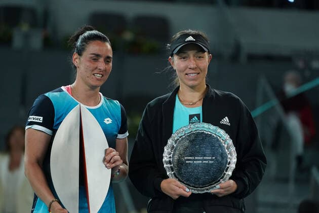 May 8, 2022, Madrid, Spain: Ons Jabeur (L) of Tunisia celebrates with a trophy and Jessica Pegula of the United States, with the runner up trophy following the Women s Singles final match during day ten of Mutua Madrid Open at La Caja Magica. Ons Jabeur beats Jessica Pegula Madrid Spain - ZUMAs197 20220508_zaa_s197_028 Copyright: xAtilanoxGarciax