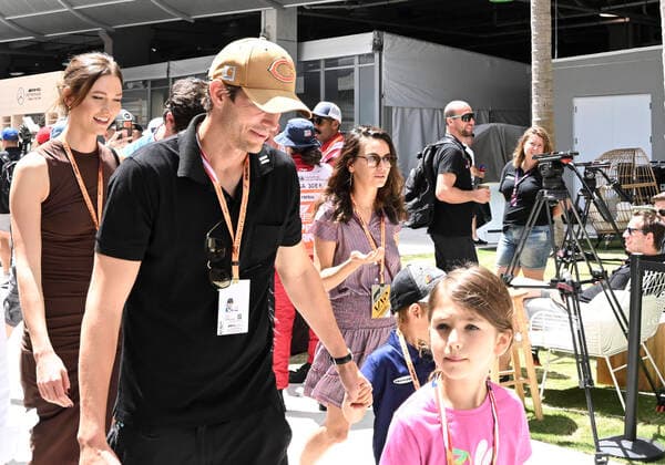 8th May 2022; Miami, Florida, USA; Ashton Kutcher and Mila Kunos (right) tour the paddock with their children and actress Karlie Kloss prior to the start of the Formula 1 CRYPTO.COM Miami Grand Prix  ActionPlus12388120 DougxMurray Content restricted for UK based newspaper