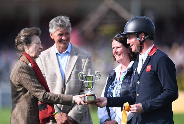 8th May 2022, Badminton Estate, Gloucestershire, England; Mars Equestrian Badminton Horse Trials, day 5; Oliver Townend receives the third place trophy from HRH Princess Anne  ActionPlus12388137 SimonxWest Content restricted for UK based newspaper