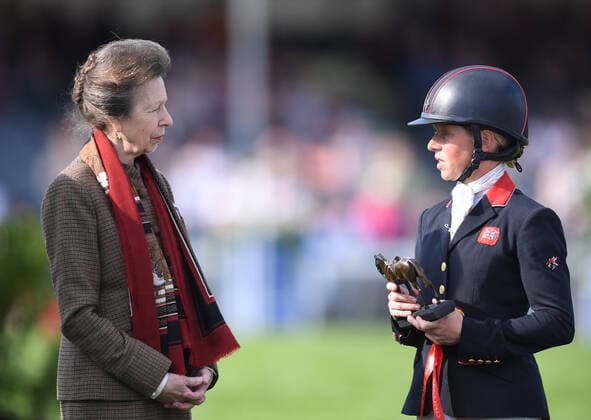 8th May 2022, Badminton Estate, Gloucestershire, England; Mars Equestrian Badminton Horse Trials, day 5; Rosalind Canter receives the runners up trophy from HRH Princess Anne after coming second on her horse Lordships Graffalo in Badminton Horse Trials 2022  ActionPlus12388140 SimonxWest Content restricted for UK based newspaper