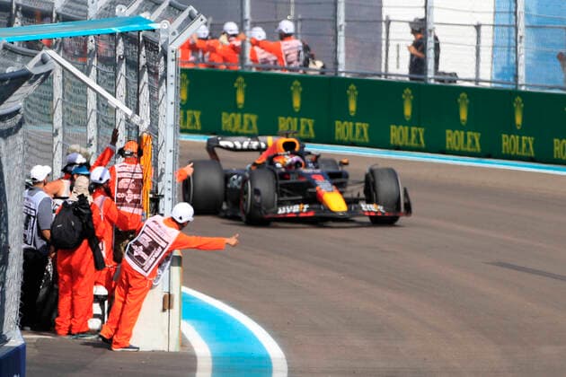 MIAMI GARDENS, FL - MAY 08: Safety crew congratulate Oracle Red Bull Racing Honda driver Max Verstappen (1) of the Netherlands during the Formula 1 CRYPTO.COM Miami Grand Prix on May 8, 2022 at Miami International Autodrome in Miami Gardens, FL.(Photo by Jeff Robinson Icon Sportswire) AUTO: MAY 08 F1 Crypto.com Miami Grand Prix Icon22050827641