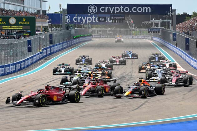 MIAMI GARDENS, FL - MAY 08: From left, Scuderia Ferrari driver Charles Leclerc, Scuderia Ferrari driver Carlos Sainz and Oracle Red Bull driver Max Verstappen lead the field at the start of the Formula 1 CRYPTO.COM Miami Grand Prix on May 8, 2022 at Miami Autodrome in Miami Gardens, FL. (Photo by Doug Murray Icon Sportswire) AUTO: MAY 08 F1 Crypto.com Miami Grand Prix Icon79620220508052