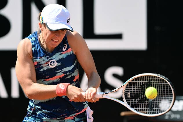 May 11, 2022, ROME: Iga Swiatek of Poland in action against Elena-Gabriela Ruse of Romania during their women s singles second round match at the Italian Open tennis tournament in Rome, Italy, 11 May 2022. ANSA ETTORE FERRARI Italian Open tennis tournament  - ZUMAa110 20220511_zaf_a110_075 Copyright: xEttorexFerrarix