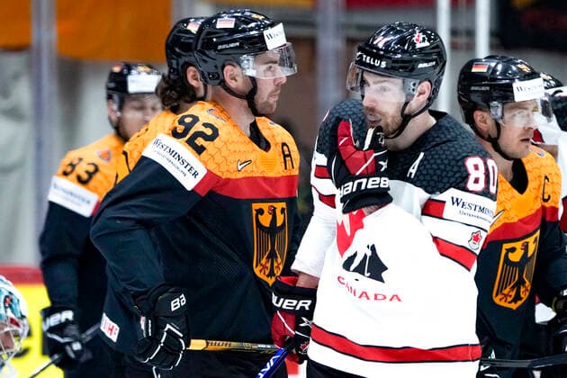 HELSINKI, FINLAND MAY 13 Marcel Noebels of Germany L and Pierre Luc Dubois of Canada R during the 2022 IIHF Ice Hockey World Championship match between Germany and Canada at Helsinki Ice Hall on May 13, 2022 in Helsinki, Finland Helsinki Ice Hall Uusimaa Finland  Copyright: xJustPictures.ch JarixPestelaccix