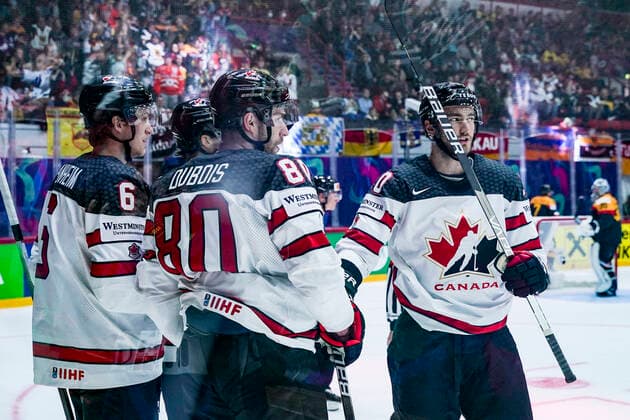 HELSINKI, FINLAND MAY 13 Travis Sanheim of Canada L , Pierre Luc Dubois of Canada and Nicolas Roy of Canada R celebrates during the 2022 IIHF Ice Hockey World Championship match between Germany and Canada at Helsinki Ice Hall on May 13, 2022 in Helsinki, Finland Helsinki Ice Hall Uusimaa Finland  Copyright: xJustPictures.ch JarixPestelaccix