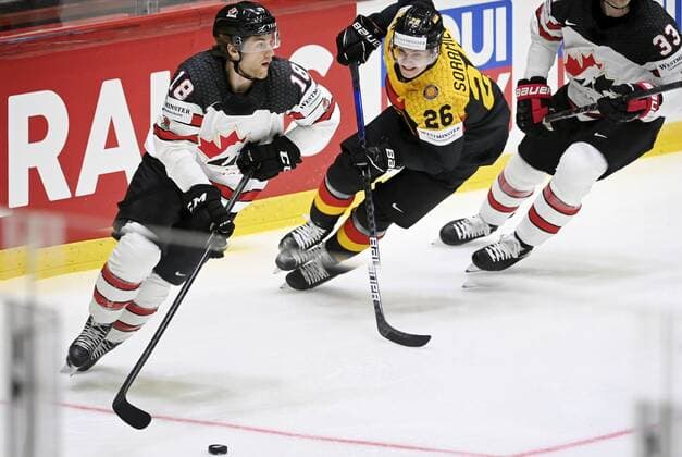 Samuel Soramies of Germany and Dawson Mercer of Canada during the 2022 IIHF Ice hockey, Eishockey World Championships preliminary round group A match between Germany and Canada in Helsinki on May 13th, 2022. Helsinki Finland LKLAPA20220513202249V318  Copyright: xAnttixAimo-Koivistox