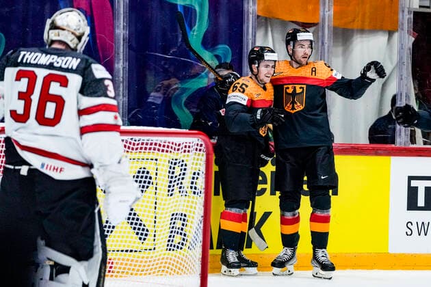 HELSINKI, FINLAND MAY 13 Marc Michaelis of Germany celebrates his goal with Marcel Noebels of Germany R celebrates during the 2022 IIHF Ice Hockey World Championship match between Germany and Canada at Helsinki Ice Hall on May 13, 2022 in Helsinki, Finland Helsinki Helsinki Ice Hall Uusimaa Finland  Copyright: xJustPictures.ch JarixPestelaccix