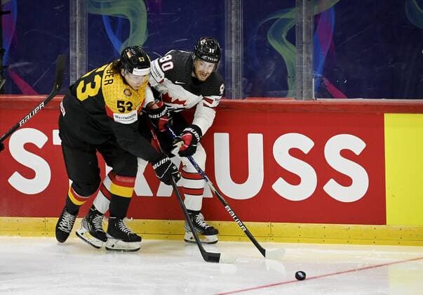 Moritz Seider of Germany and Pierre-Luc Dubois of Canada during the 2022 IIHF Ice hockey, Eishockey World Championships preliminary round group A match between Germany and Canada in Helsinki on May 13th, 2022. Helsinki Finland LKLAPA20220513202055I282  Copyright: xAnttixAimo-Koivistox