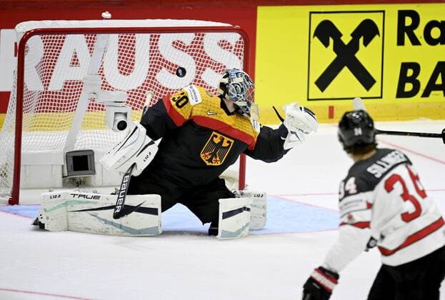 Cole Sillinger of Canada scores past Philipp Grubauer of Germany during the 2022 IIHF Ice hockey, Eishockey World Championships preliminary round group A match between Germany and Canada in Helsinki on May 13th, 2022. Helsinki Finland LKLAPA20220513203314T511  Copyright: xAnttixAimo-Koivistox