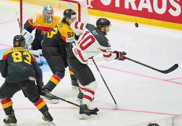 Moritz Seider Nr.53 of Germany Detroit )compete, fight for the puck against, Nicolas Roy Nr. 10 of Canada in the match GERMANY - CANADA IIHF Ice hockey, Eishockey World Championship, WM, Weltmeisterschaft Group B in Helsinki, Finland, May 13, 2022, Season 2021 2022