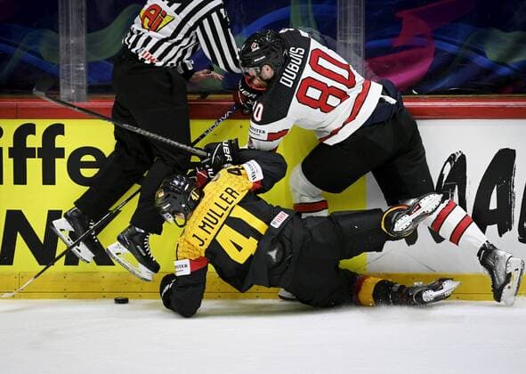 Jonas Muller of Germany and Pierre-Luc Dubois of Canada during the 2022 IIHF Ice hockey, Eishockey World Championships preliminary round group A match between Germany and Canada in Helsinki on May 13th, 2022. Helsinki Finland LKLAPA20220513214925Q474  Copyright: xAnttixAimo-Koivistox