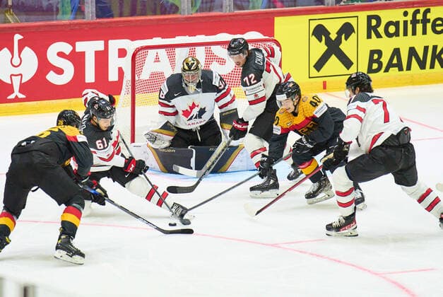 Alexander EHL Nr.40 of Germany compete, fight for the puck against, Thomas Chabot Nr. 72 of Canada in the match GERMANY - CANADA IIHF Ice hockey, Eishockey World Championship, WM, Weltmeisterschaft Group B in Helsinki, Finland, May 13, 2022, Season 2021 2022