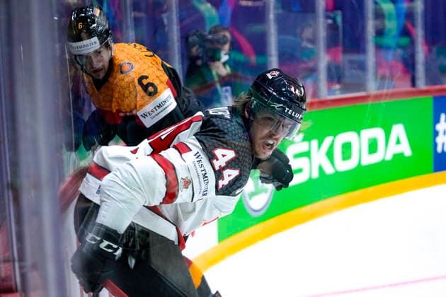 HELSINKI, FINLAND MAY 13 Maxime Comtois of Canada against Kai Wissmann of Germany during the 2022 IIHF Ice Hockey World Championship match between Germany and Canada at Helsinki Ice Hall on May 13, 2022 in Helsinki, Finland Helsinki Ice Hall Uusimaa Finland  Copyright: xJustPictures.ch JarixPestelaccix