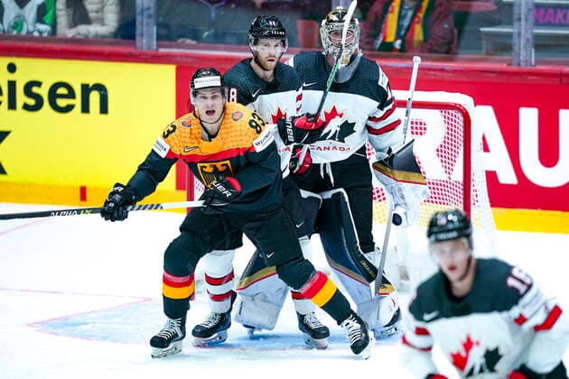 HELSINKI, FINLAND MAY 13 Leonhard Pfoderl of Germany fights for position with Damon Severson of Canada during the 2022 IIHF Ice Hockey World Championship match between Germany and Canada at Helsinki Ice Hall on May 13, 2022 in Helsinki, Finland Helsinki Helsinki Ice Hall Uusimaa Finland  Copyright: xJustPictures.ch JarixPestelaccix