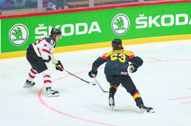 Kent Johnson Nr. 93 of Canada compete, fight for the puck against, Moritz Seider Nr.53 of Germany in the match GERMANY - CANADA 3-5 IIHF Ice hockey, Eishockey World Championship, WM, Weltmeisterschaft Group B in Helsinki, Finland, May 13, 2022, Season 2021 2022