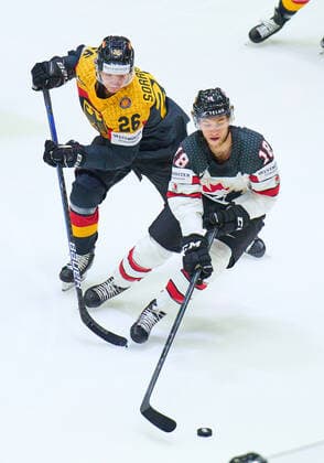 Samuel Soramies Nr.26 of Germany compete, fight for the puck against, Dawson Mercer Nr. 18 of Canada in the match GERMANY - CANADA 3-5 IIHF Ice hockey, Eishockey World Championship, WM, Weltmeisterschaft Group B in Helsinki, Finland, May 13, 2022, Season 2021 2022