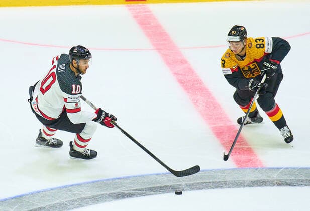 Nicolas Roy Nr. 10 of Canada compete, fight for the puck against, Leonard Leo Pföderl Nr. 83 of Germany in the match GERMANY - CANADA 3-5 IIHF Ice hockey, Eishockey World Championship, WM, Weltmeisterschaft Group B in Helsinki, Finland, May 13, 2022, Season 2021 2022