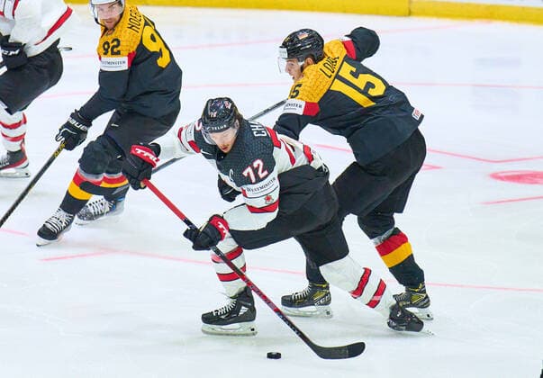 Stefan Loibl Nr.15 of Germany compete, fight for the puck against, Thomas Chabot Nr. 72 of Canada in the match GERMANY - CANADA 3-5 IIHF Ice hockey, Eishockey World Championship, WM, Weltmeisterschaft Group B in Helsinki, Finland, May 13, 2022, Season 2021 2022