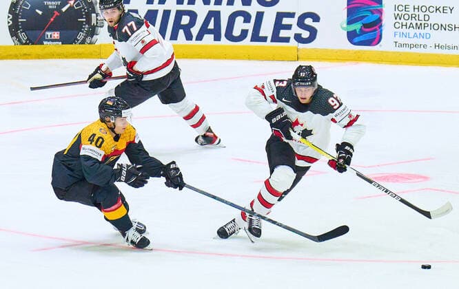 Alexander EHL Nr.40 of Germany compete, fight for the puck against, Kent Johnson Nr. 93 of Canada in the match GERMANY - CANADA 3-5 IIHF Ice hockey, Eishockey World Championship, WM, Weltmeisterschaft Group B in Helsinki, Finland, May 13, 2022, Season 2021 2022