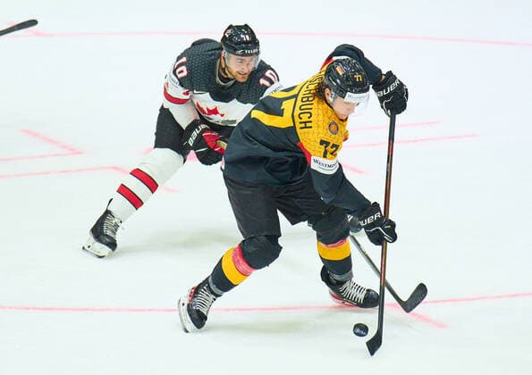 Daniel Fischbuch Nr.77 of Germany compete, fight for the puck against, Nicolas Roy Nr. 10 of Canada in the match GERMANY - CANADA 3-5 IIHF Ice hockey, Eishockey World Championship, WM, Weltmeisterschaft Group B in Helsinki, Finland, May 13, 2022, Season 2021 2022