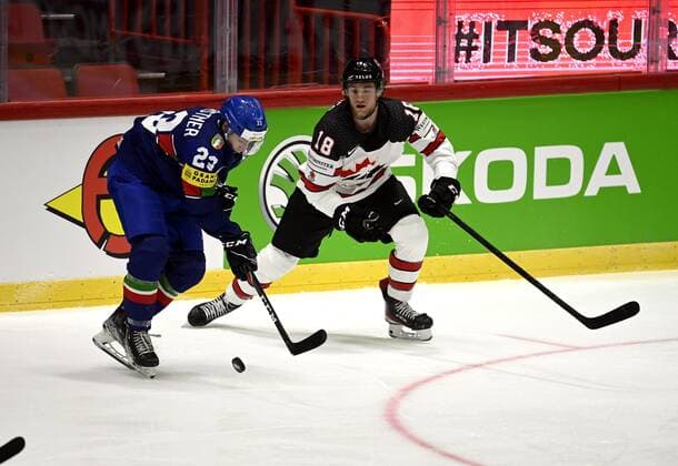 Simon Kostner (L) of Italy vies with Dawson Mercer of Canada during the 2022 IIHF Ice hockey, Eishockey World Championships preliminary round group A match between Italy and Canada in Helsinki on May 15, 2022. Helsinki Finland LKFTJK20220515123419RUJA  Copyright: xAnttixAimo-Koivistox