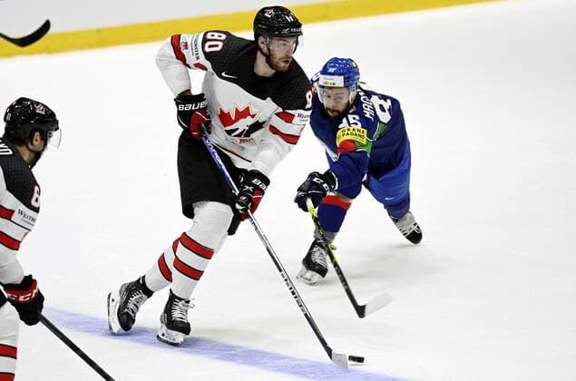 Pierre-Luc Dubois (C) of Canada vies with Marco Magnabosco of Italy during the 2022 IIHF Ice hockey, Eishockey World Championships preliminary round group A match between Italy and Canada in Helsinki on May 15, 2022. Helsinki Finland LKFTJK20220515133648EPFX  Copyright: xAnttixAimo-Koivistox