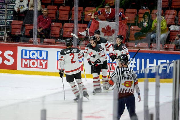 15 05 2022, Helsinki, Helsinki Ice Hall, 2022 IIHF Ice Hockey World Championship Italy Canada, Canada celebrate the 1 4 goal From left 2 Zach Whitecloud Canada , scorer 93 Kent Johnson Canada , 18 Dawson Mercer Canada and 13 Matt Barzal Canada Helsinki Helsinki Ice Hall Uusimaa Finland  Copyright: xJustPictures.ch AndreaxBrancax