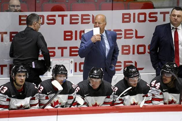 Head coach Claude Julien (C) of Team Canada tends the bench during the 2022 IIHF Ice hockey, Eishockey World Championships preliminary round group A match between Italy and Canada in Helsinki on May 15, 2022. Helsinki Finland LKFTJK20220515131501BAHH  Copyright: xAnttixAimo-Koivistox
