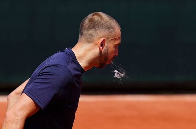 Mandatory Credit: Photo by Javier Garcia Shutterstock (12942464bu) A relaxed Daniel Evans spits during practice French Open Tennis, Tuesday Previews, Roland Garros, Paris, France - 17 May 2022 French Open Tennis, Tuesday Previews, Roland Garros, Paris, France - 17 May 2022  Copyright: xJavierxGarcia Shutterstockx 12942464bu