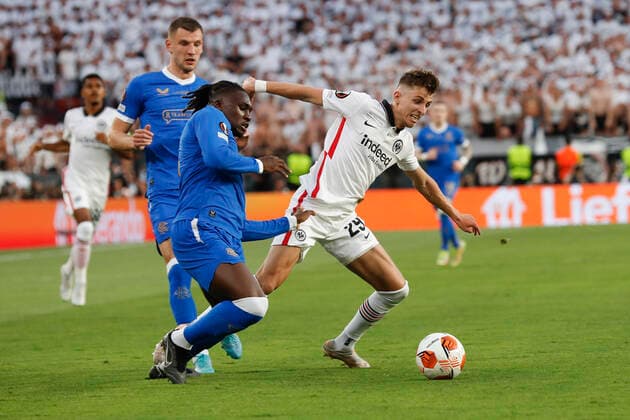Eintracht Frankfurt v Rangers UEFA Europa League Jesper Lindstrom of Eintracht Frankfurt is fouled by Calvin Bassey of Rangers during the UEFA Europa League Final between Eintracht Frankfurt and Rangers at Ramon Sanchez Pizjuan Stadium, Seville Content Not Available For UK Newspapers Copyright: xPaulxChestertonx FIL-16924-0050 UK Newspapers OUT