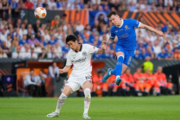Daichi Kamada Eintracht Frankfurt, 15 in header duel with Ryan Jack Glasgow Rangers, 8 , Eintracht Frankfurt vs Glasgow Rangers, football, Europa League, final, season 2021 2022, 18 05 2022, Eintracht Frankfurt vs Glasgow Rangers, football, Europa League, final, season 2021 2022, 18 05 2022 Sevilla Copyright: xEibner-Pressefotox EP_MBL