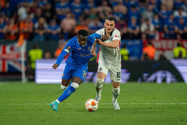 SOCCER - UEFA EL, Frankfurt vs Glasgow SEVILLA,SPAIN,18.MAY.22 - SOCCER - UEFA Europa League, final, Eintracht Frankfurt vs Glasgow Rangers. Image shows Fashion Sakala (Glasgow) and Filip Kostic (Frankfurt).  GEPAxpictures xJohannesxFriedl