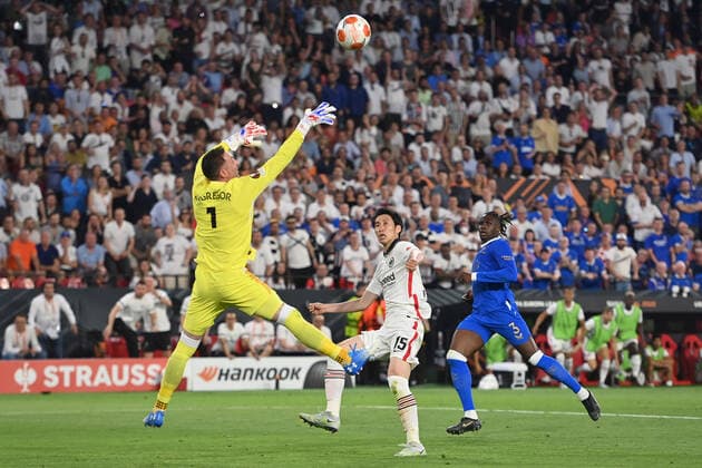 Goal chance Daichi KAMADA Eintracht Frankfurt ,Heber, action, duel against Calvin Bassey Rangers FC and goalkeeper Allan McGregor Rangers FC penalty area scene Football Europa League, Final Eintracht Frankfurt Glasgow Rangers 5 4 i E on 18 05 2022 in Seville Estadio Ramon Sanchez Pizjuan