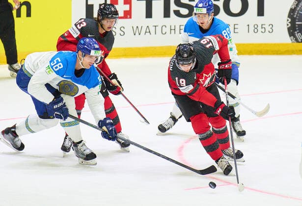 Drake Batherson Nr. 19 of CanadaKent Johnson Nr. 93 of Canada compete, fight for the puck against, Viktor Svedberg Nr. 58 of Kazakhstan Anton Sagadeyev Nr.89 of Kazakhstan in the match CANADA - KAZAKHSTAN of the IIHF Ice hockey, Eishockey World Championship, WM, Weltmeisterschaft Group B in Helsinki, Finland, May 19, 2022, Season 2021 2022