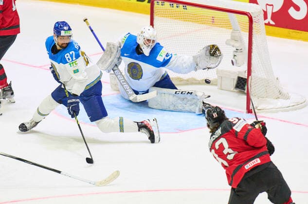 Andrei Shutov, KAZ 43 defend Ryan Graves Nr. 33 of Canada in the match CANADA - KAZAKHSTAN of the IIHF Ice hockey, Eishockey World Championship, WM, Weltmeisterschaft Group B in Helsinki, Finland, May 19, 2022, Season 2021 2022