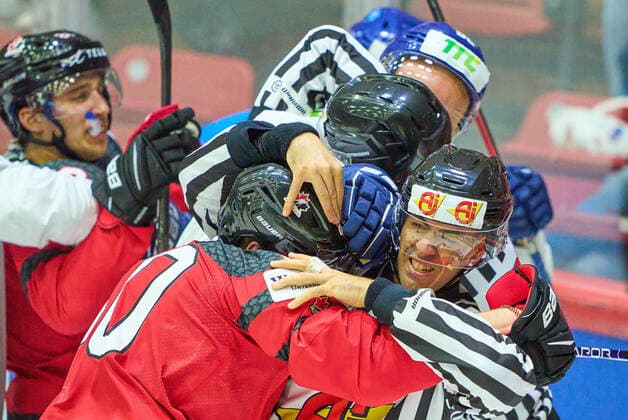 Pierre-Luc Dubois Nr. 80 of Canada fight against Viktor Svedberg Nr. 58 of Kazakhstan referee in the middle in the match CANADA - KAZAKHSTAN of the IIHF Ice hockey, Eishockey World Championship, WM, Weltmeisterschaft Group B in Helsinki, Finland, May 19, 2022, Season 2021 2022