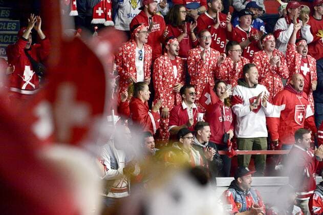 Fans of Team Switzerland cheer their 3-6 win after the 2022 IIHF Ice hockey, Eishockey World Championships preliminary round group A match between Canada and Switzerland in Helsinki on May 21, 2022. Helsinki Finland LKFTVX20220521191349OTNF  Copyright: xMikkoxStigx