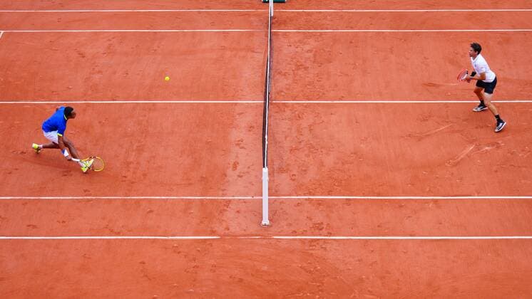Mandatory Credit: Photo by Javier Garcia Shutterstock (12942474c) Hugo Dallien stretches for the ball during his win over Dominic Thiem French Open Tennis, Day 1, Roland Garros, Paris, France - 22 May 2022 French Open Tennis, Day 1, Roland Garros, Paris, France - 22 May 2022  Copyright: xJavierxGarcia Shutterstockx 12942474c