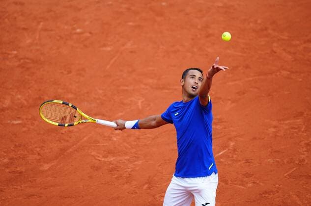 Mandatory Credit: Photo by Javier Garcia Shutterstock (12942474b) Hugo Dallien serves during his win over Dominic Thiem French Open Tennis, Day 1, Roland Garros, Paris, France - 22 May 2022 French Open Tennis, Day 1, Roland Garros, Paris, France - 22 May 2022  Copyright: xJavierxGarcia Shutterstockx 12942474b