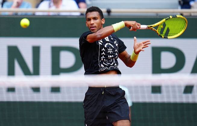 Mandatory Credit: Photo by Javier Garcia Shutterstock (12942474bx) Felix Auger-Aliassime in first round action French Open Tennis, Day 1, Roland Garros, Paris, France - 22 May 2022 French Open Tennis, Day 1, Roland Garros, Paris, France - 22 May 2022  Copyright: xJavierxGarcia Shutterstockx 12942474bx