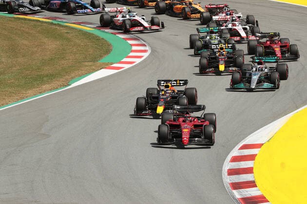 22nd May 2022; Barcelona, Circuit de Barcelona Catalunya, Spain; F1 Grand Prix of Spain, Race Day; Scuderia Ferrari, Charles Leclerc leads the pack into turn 1  ActionPlus12391944 Octane