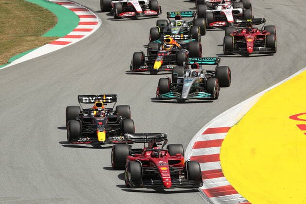 22nd May 2022; Barcelona, Circuit de Barcelona Catalunya, Spain; F1 Grand Prix of Spain, Race Day; Scuderia Ferrari, Charles Leclerc lead the pack through turn 1  ActionPlus12391945 Octane