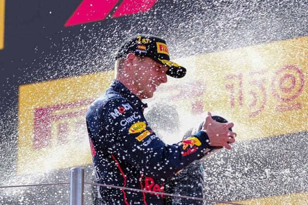 Scene podium with Sergio Perez MEX, Oracle Red Bull Racing, 11, Max Verstappen NED, Oracle Red Bull Racing, 1 and George Russell UK, Mercedes AMG Petronas F1 Team, 63 showering champagne, Champage, ESP, Formula One Pirelli Gran Premio de Espana, Formula 1, Sunday, 2022 season, 22 05 2022, ESP, Formula One Pirelli Gran Premio de Espana, Formula 1, Sunday, 2022 season, 22 05 2022, Barcelona Copyright: xEibner-Pressefotox EP_EER