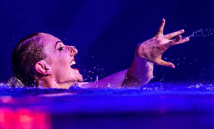 MOSCOW, RUSSIA â€“ MAY 22, 2022: Seven-time Olympic champion Svetlana Romashina performs a women s solo routine during the Zavorazhivayushchaya Krasota Mesmerising Beauty Festival featuring synchronised swimming stars at Dynamo Sports Palace. Sergei Bobylev TASS  TS132533